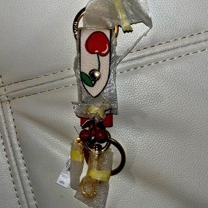 Double sided cherry Coach keychain leather